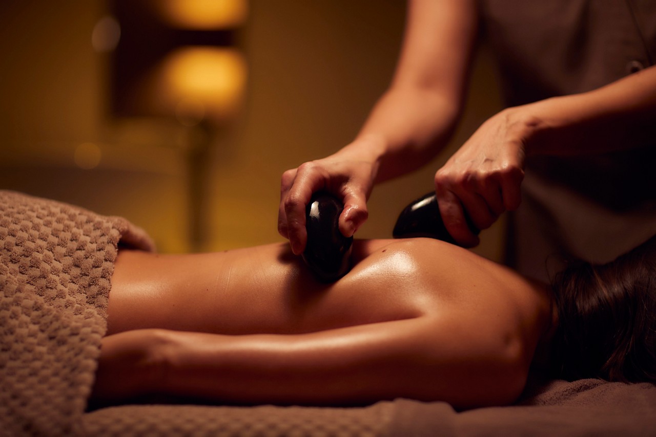 a massage featuring hot stones